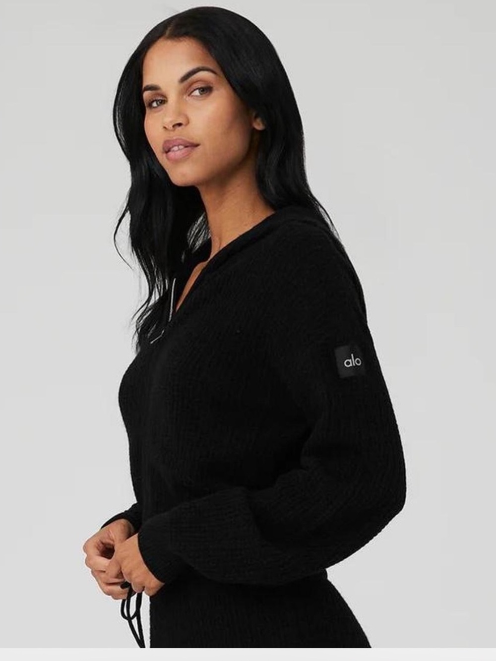 Alo Yoga Cashmere Plush Waffle Full Zip Hoodie, color negro.